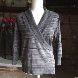 Black and gray crossover neckline sweater